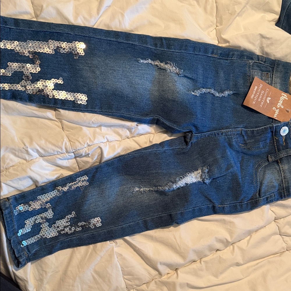 Stylish Blue Jeans with Silver Sequin Accents